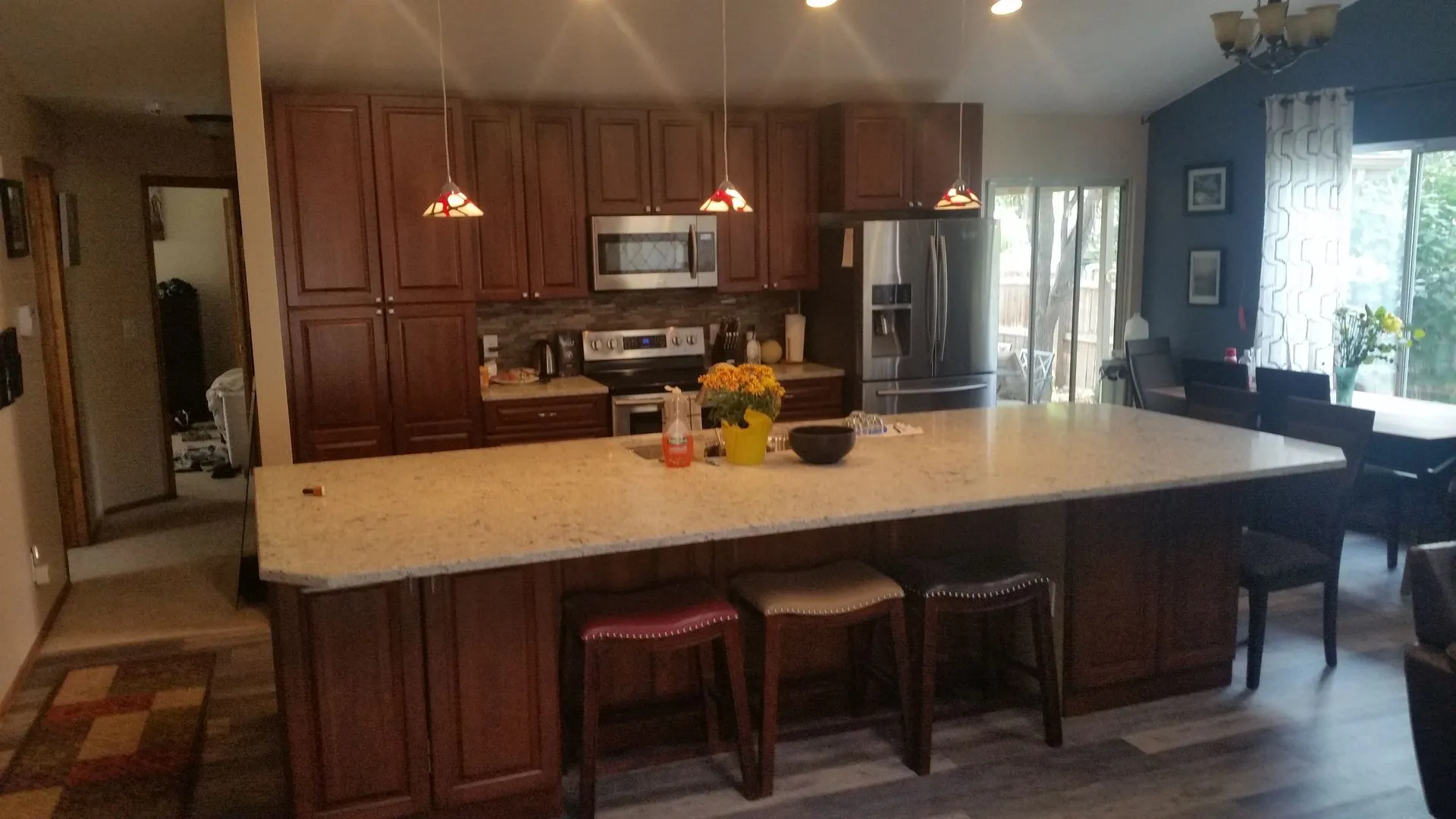 Compact Kitchenette with Glass-Front Cabinets